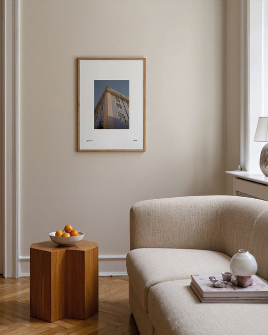 Lisbon blue tiled building facade with windows and warm sunlight, minimalist architecture print