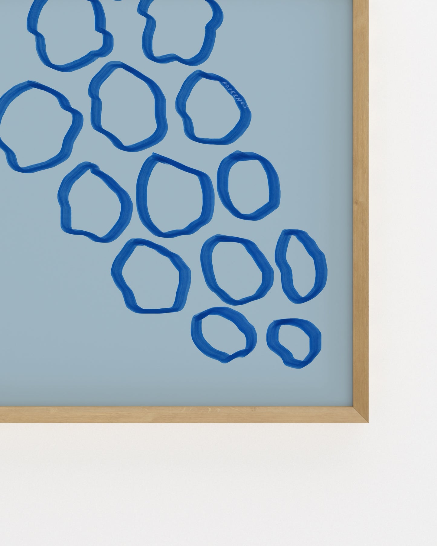 Minimal blue grape illustration on a soft blue background