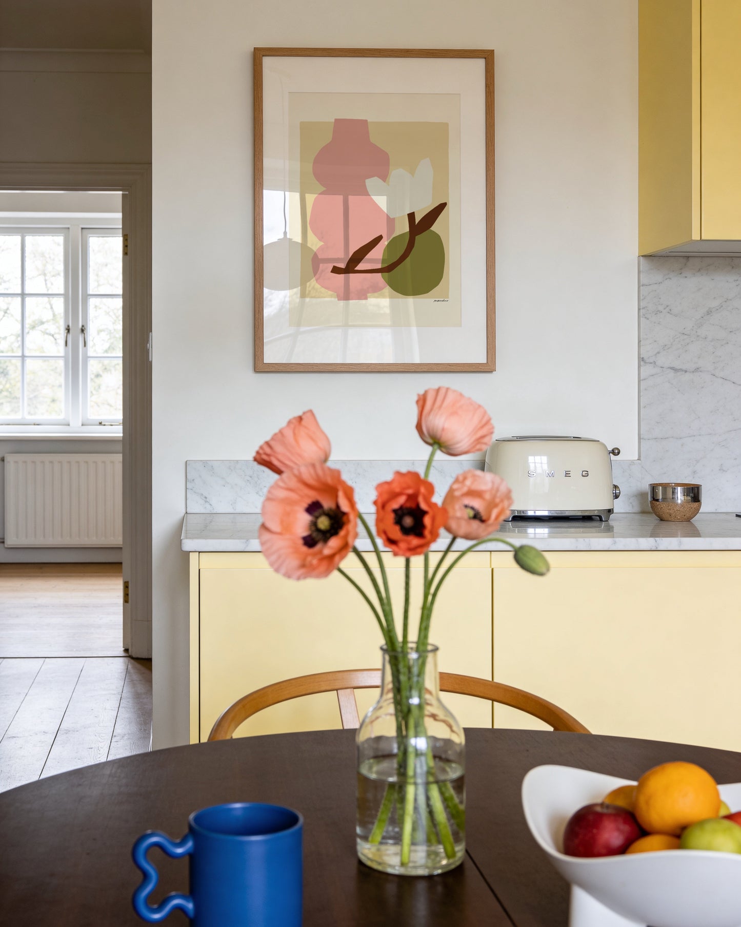 Modern abstract floral print featuring a pink vase, white flower and earthy neutral tones