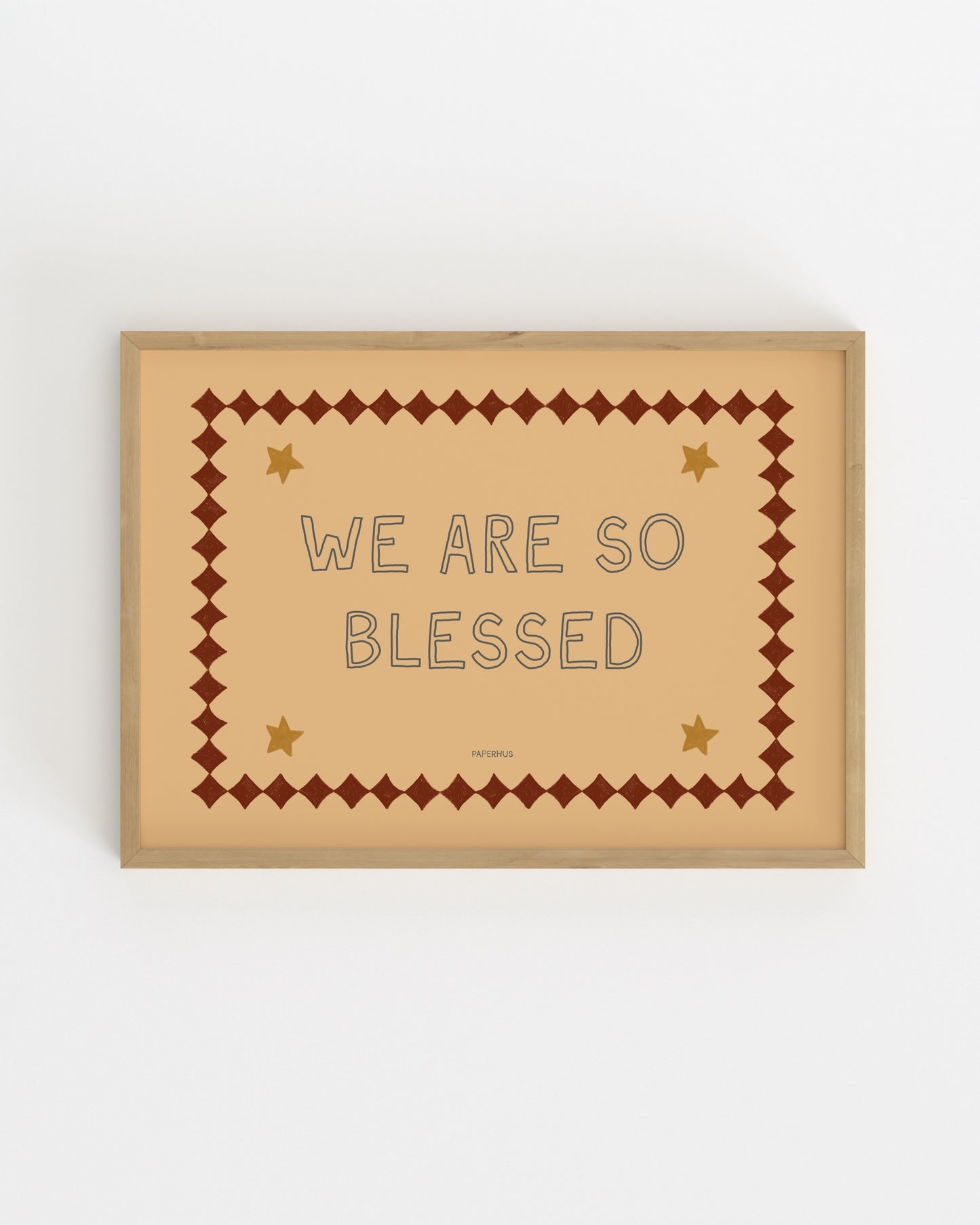 Inspirational typography print reading “We Are So Blessed” with vintage-style border and star details