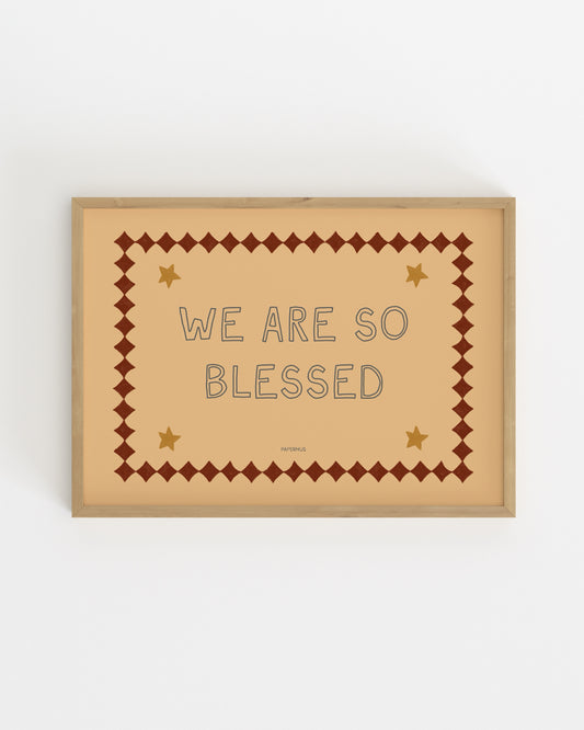 Inspirational typography print reading “We Are So Blessed” with vintage-style border and star details