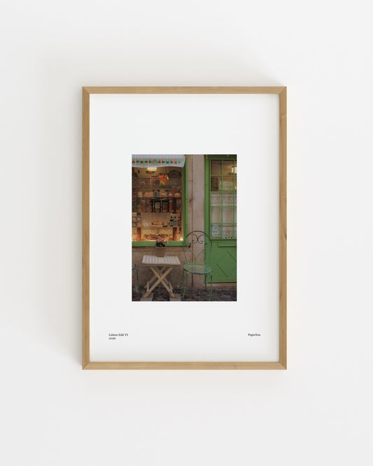 Lisbon cafe storefront photography print with green door and table, modern wall art printable
