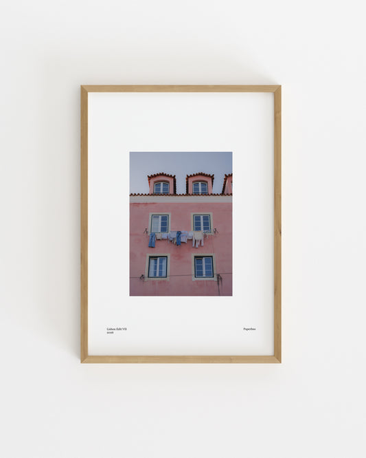 pink Lisbon building with windows and laundry, minimalist architecture photography print