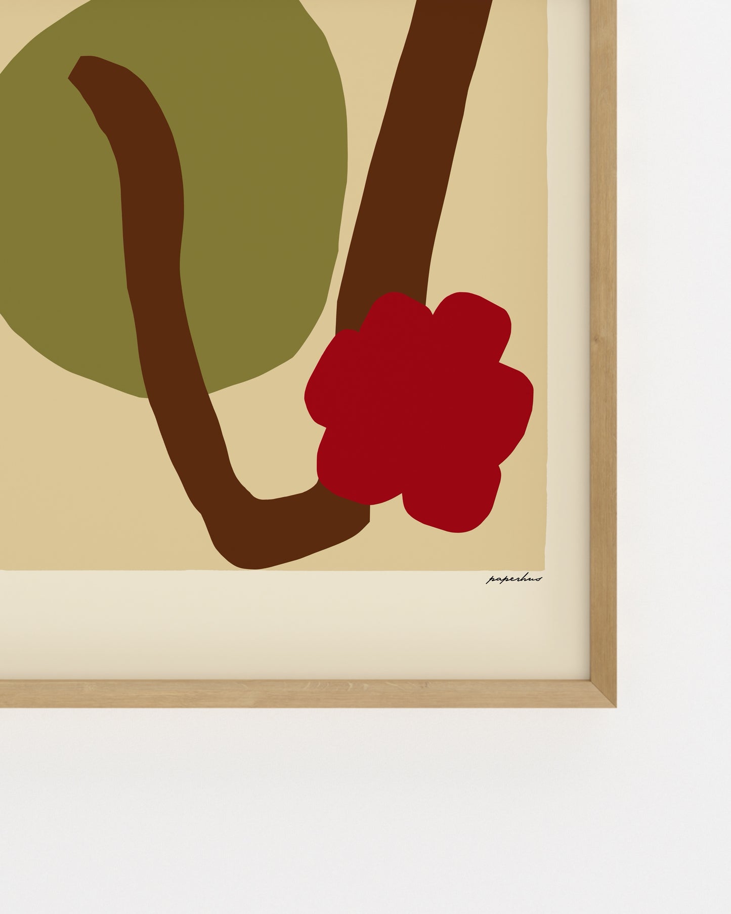 Abstract botanical wall art featuring a red flower, brown stem and olive green shape in a minimalist colour block style